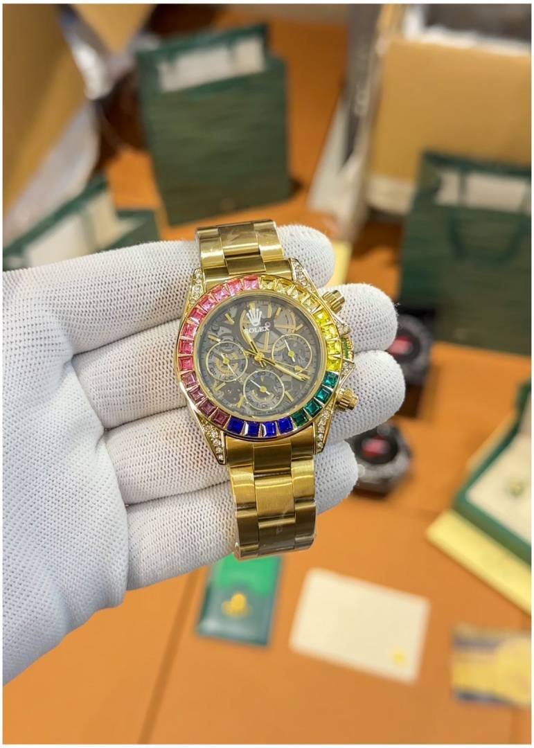 Rollex Oyster Perpetual Daytona Chosmograph Rainbow Gold