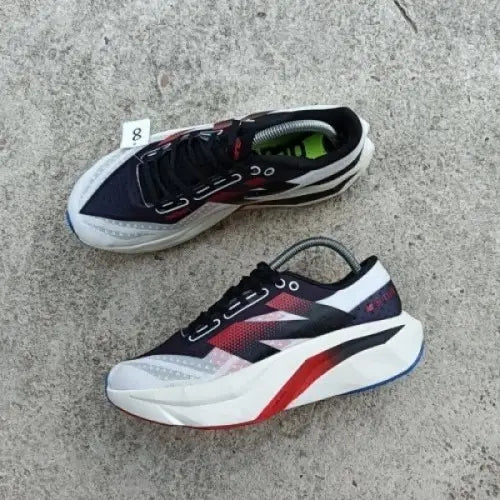New Balance sc elite white black red