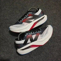 New Balance sc elite white black red