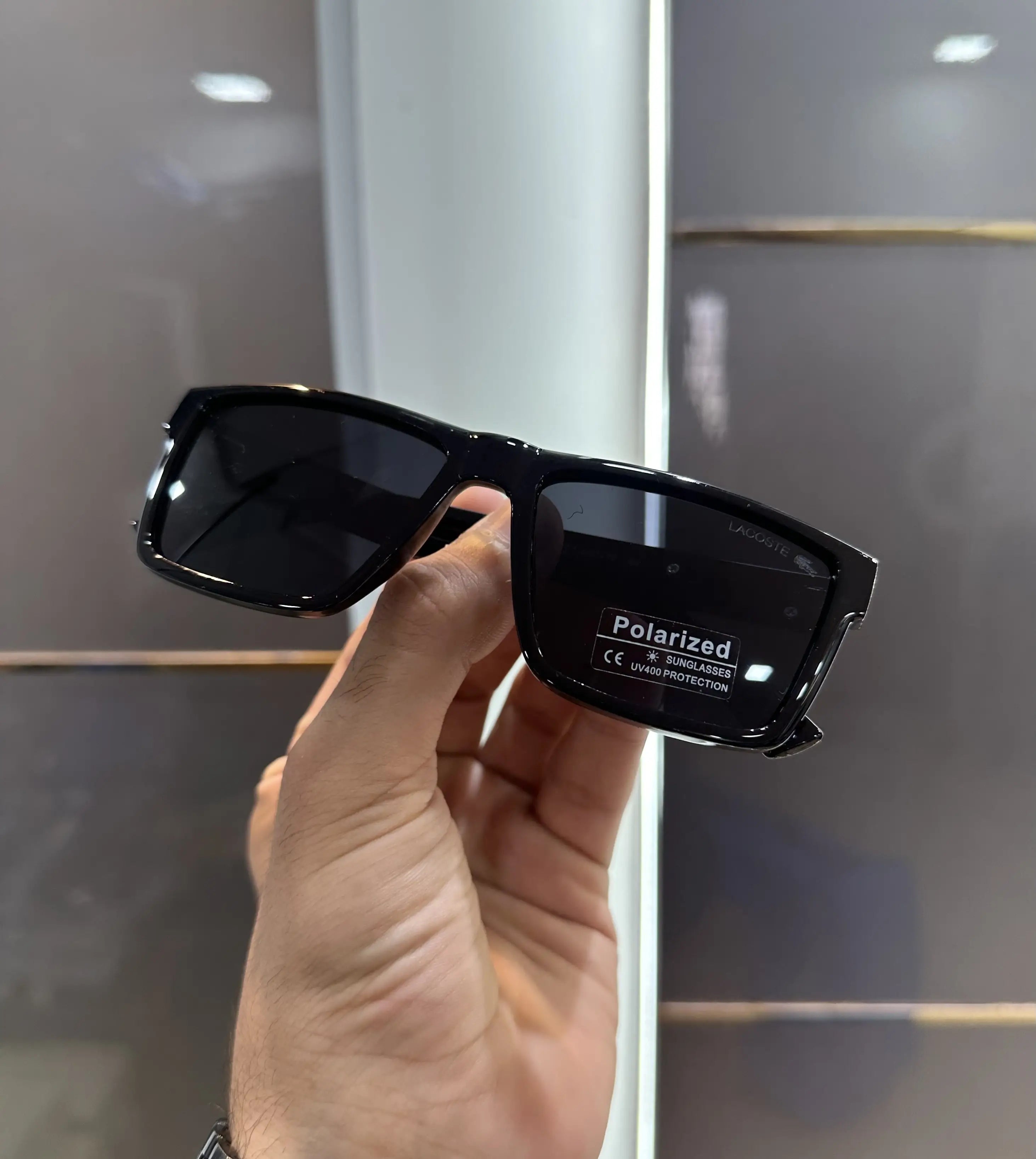 Lacost e All Black Glossy Premium Shades 328 Secondary image